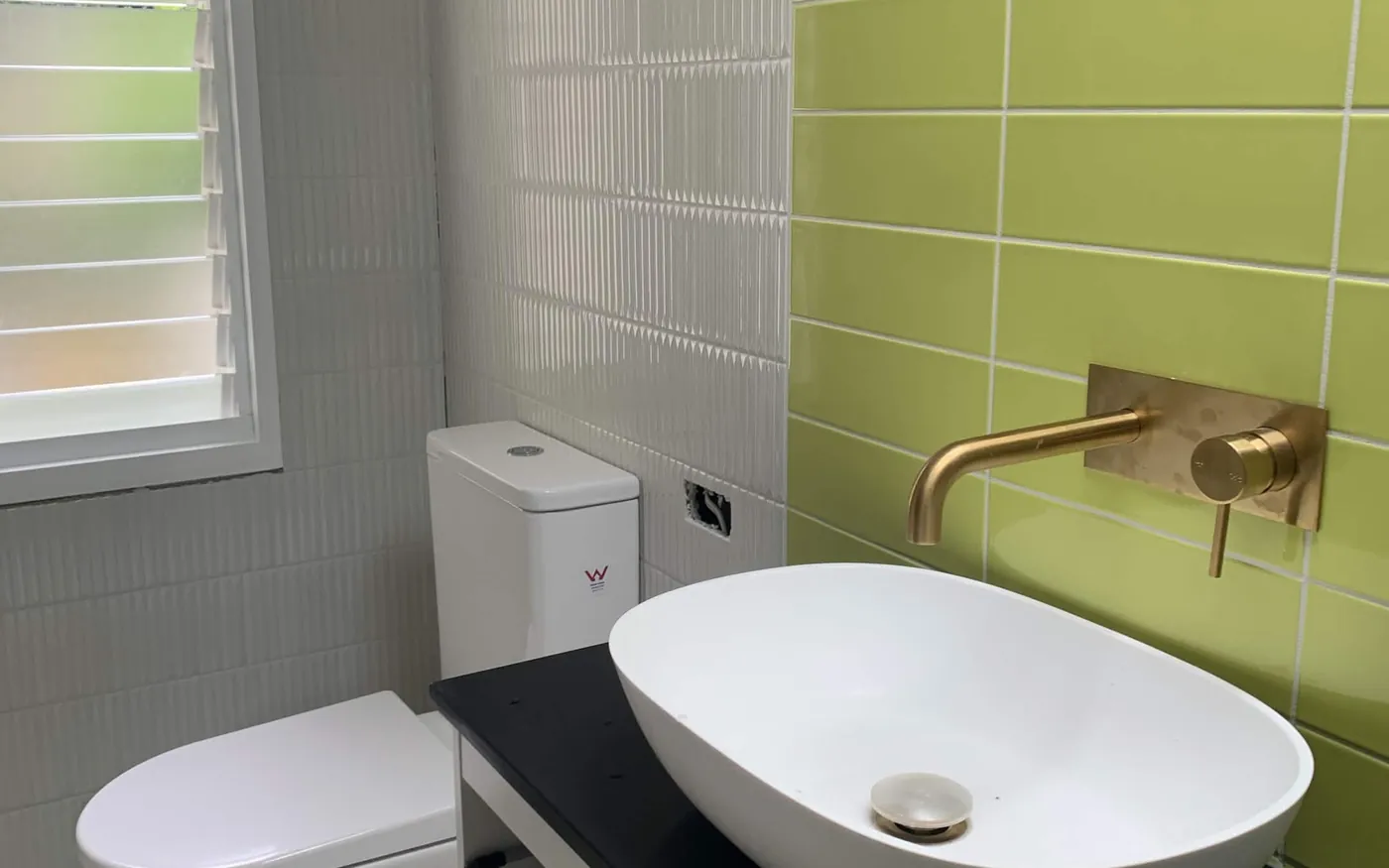 Toilet and basin fitted off in a finished bathroom by S&W Plumbing